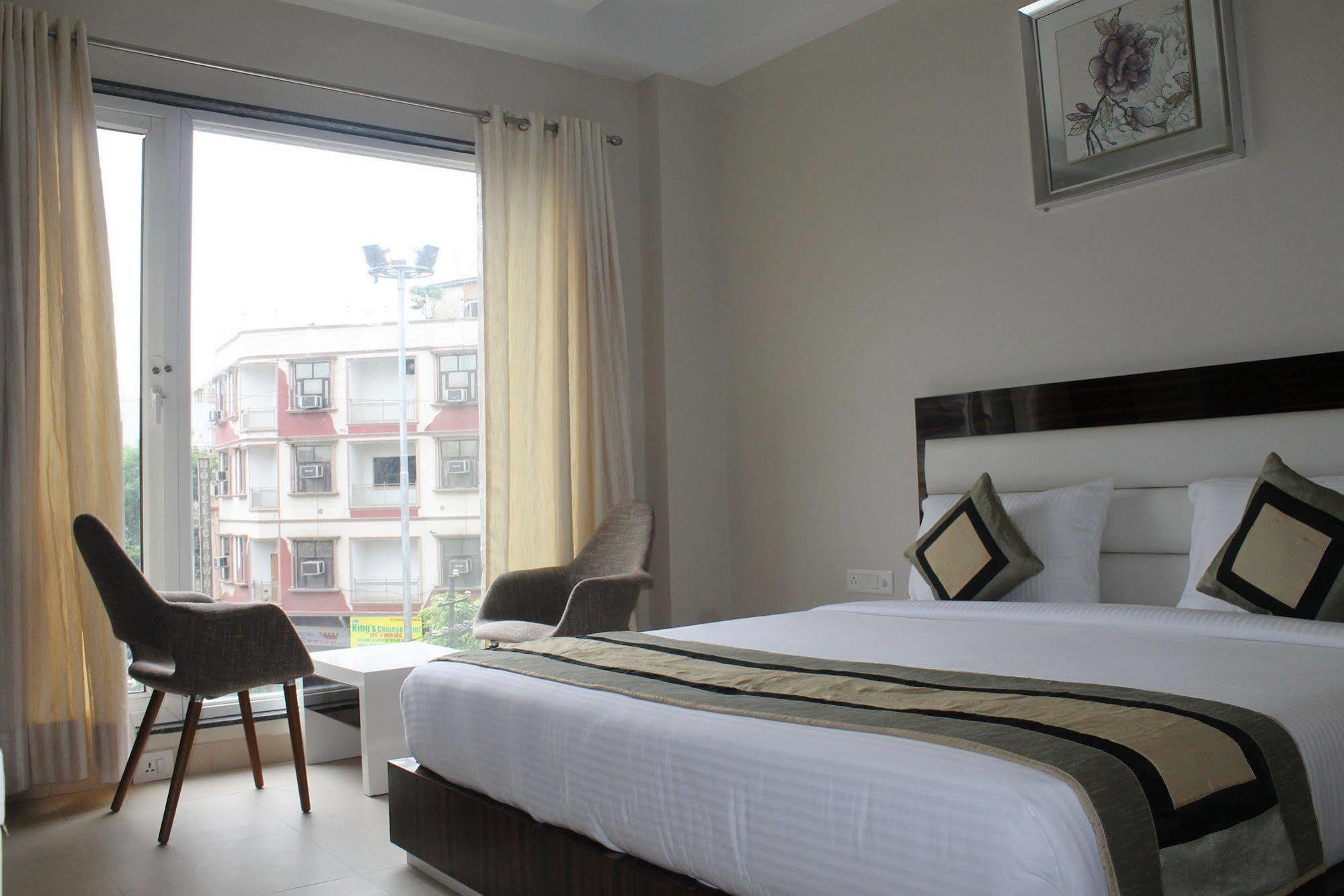 Hotel Gulnar Ню Делхи Стая снимка
